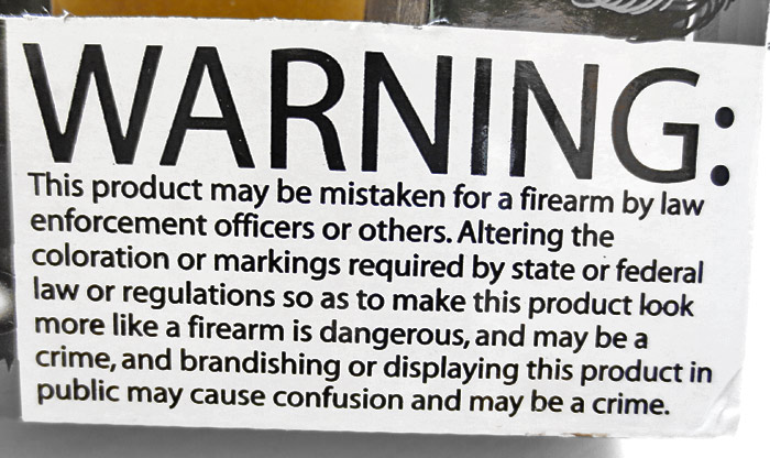 Warning lable on plastic toy guns