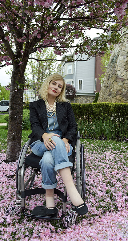 Wheelchair disabled street style wearing overalls