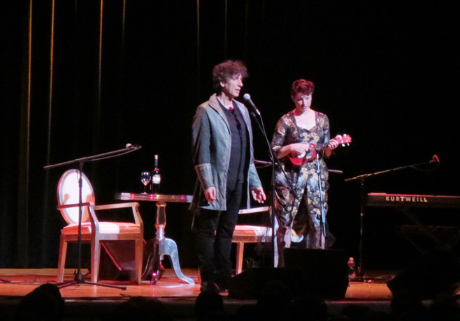 Amanda Palmer performing with ukelele and Neil Gaiman Town hall