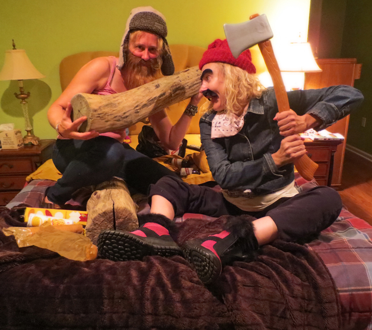 girls with axes in bed dressed as lumberjacks wearing beards