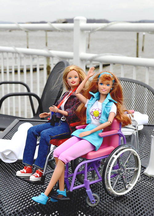Wheelchair Barbies waving by the Hudson River
