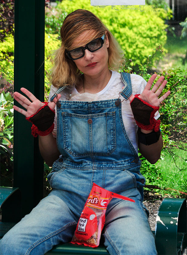 fashion blogger in overalls in Marni fall 2014 hair style