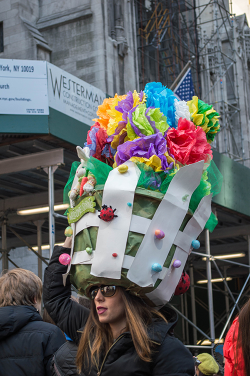woman with potted plant on her head easter nyc hat parade