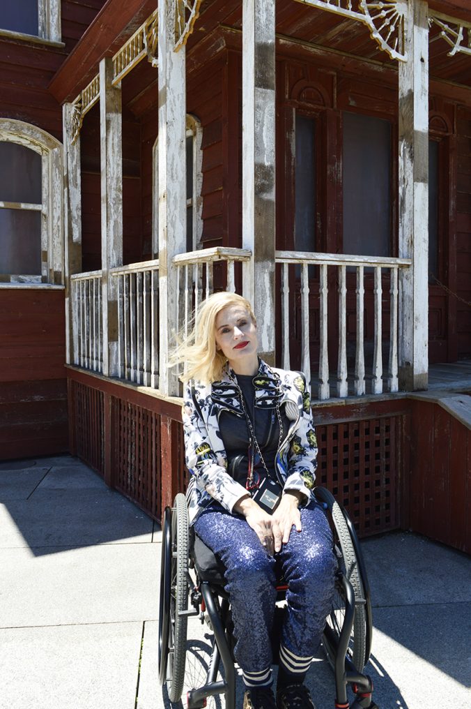 Pretty Cripple wheelchair blogger at the Psychobarn Met exhibit