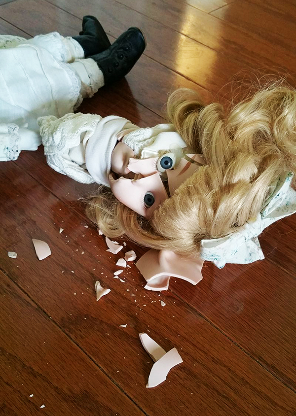 Cracked broken porcelain baby doll